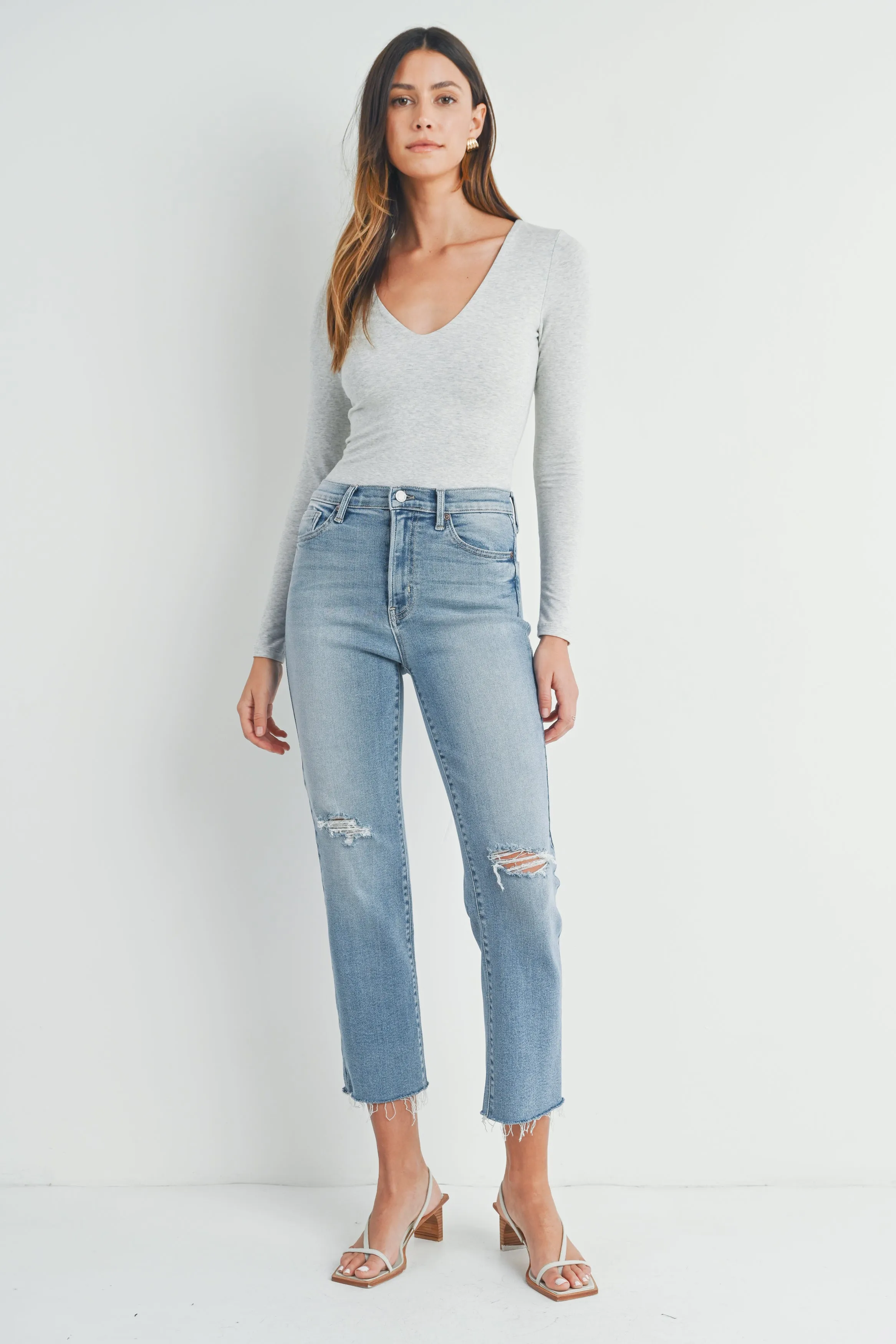 The Amelia Distressed Slim Straight Jeans